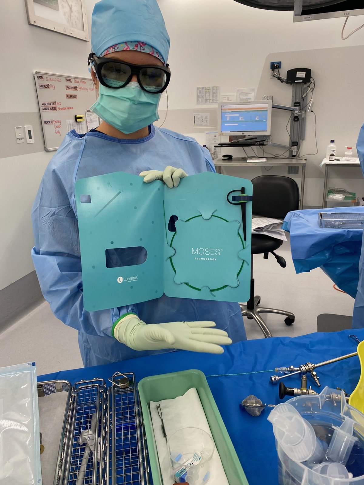 Theatre team member holding a Lumenis MOSES technology accessory panel