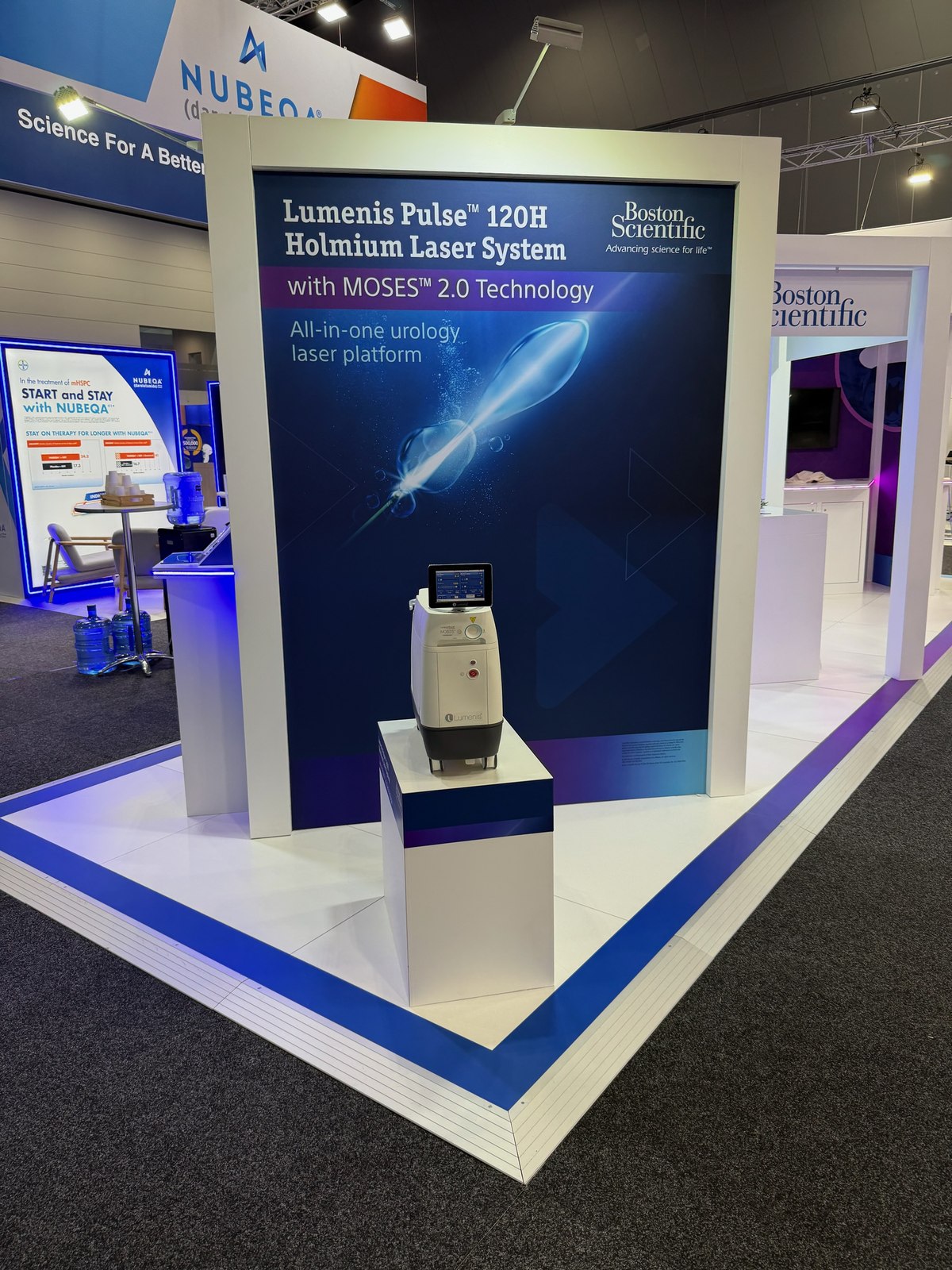 Lumenis Pulse 120H holmium laser system display at a conference stand